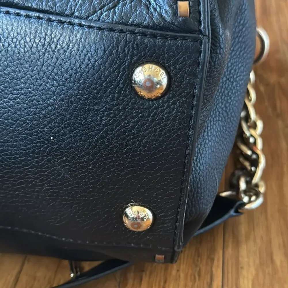micheal kors black and gold stitched hamilton bag  with lock & key